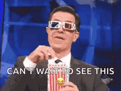 Man In Suit Holding Popcorn With 3D Glasses GIF