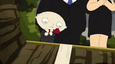 Man In Suit Holding Red Rose GIF