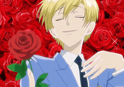 Man In Suit Holding Rose GIF