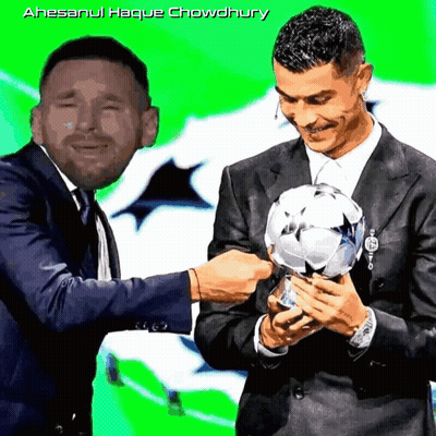 Man In Suit Holding Soccer Ball Beside Crying Man GIF