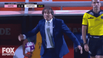 Man In Suit Holding Soccer Ball Fox Deportes Ad GIF
