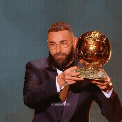 Man In Suit Holding Trophy #Imaangaz GIF