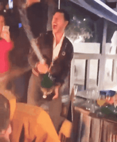 Man In Suit Holding Trophy Singing Thank You Guys So Much GIF
