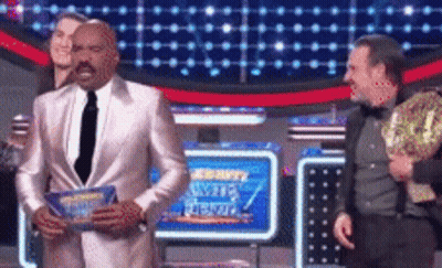Man In Suit Holding Trophy With Security Sign GIF