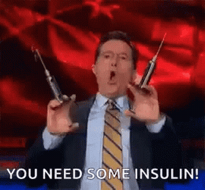 Man In Suit Holding Two Syringes Saying You Need Some Insulin GIF