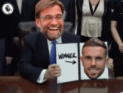 Man In Suit Holding Winner Sign GIF