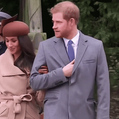 Man In Suit Holding Woman's Hand GIF