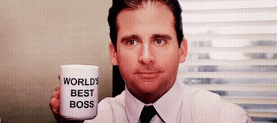 Man In Suit Holding World's Best Boss Cup GIF