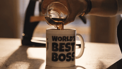 Man In Suit Holding World's Best Boss Mug GIF
