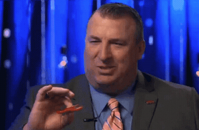 Man In Suit Holding Worm GIF