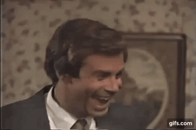 Man In Suit Hugging Another Man In Room GIF