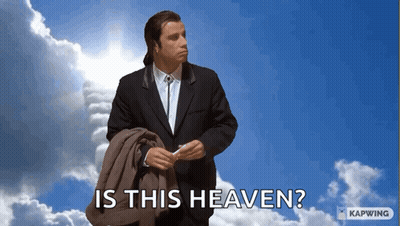 Man In Suit In Cloudy Sky Is This Heaven GIF