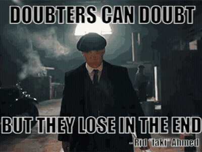 Man In Suit In Dark Alleyway Quote About Doubters GIF