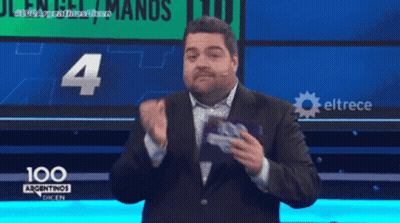 Man In Suit In Front Of 100 Argentinas Sign GIF
