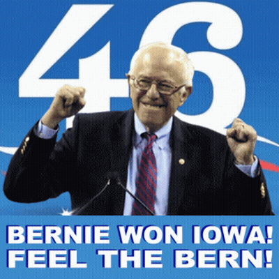 Man In Suit In Front Of Bernie Won Iowa Feel The Bern Sign GIF