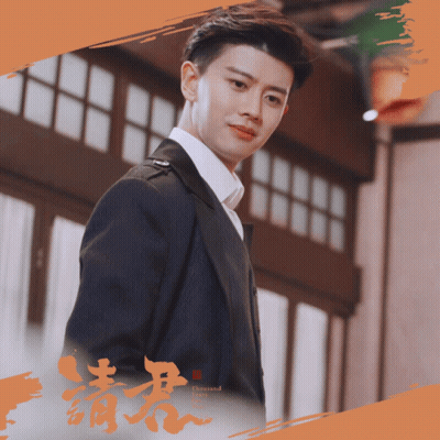 Man In Suit In Front Of Building GIF
