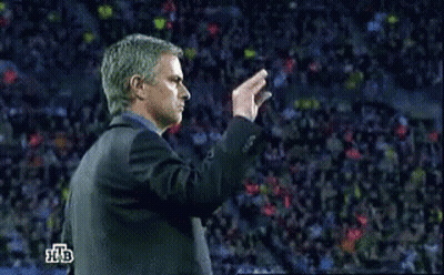 Man In Suit In Front Of Crowd With Letters HB GIF