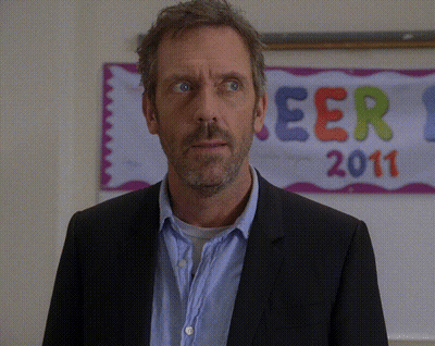Man In Suit In Front Of Eer 2011 Banner GIF