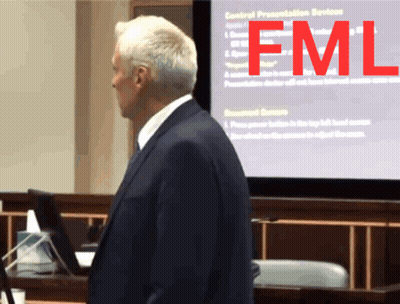 Man In Suit In Front Of FML Screen GIF