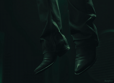 Man In Suit In Front Of Green Curtain Kepler GIF