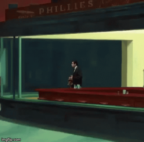 Man In Suit In Front Of Phillies Restaurant GIF