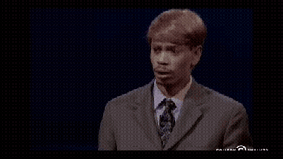 Man In Suit In Front Of Purple Number 3 GIF