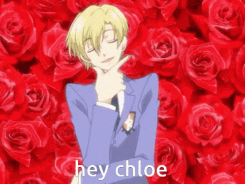 Man In Suit In Front Of Red Roses With Hey Chloe Below GIF