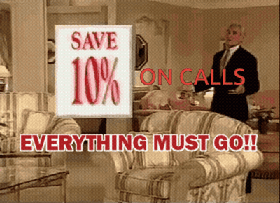 Man In Suit In Front Of Save 10% On Calls Sign GIF
