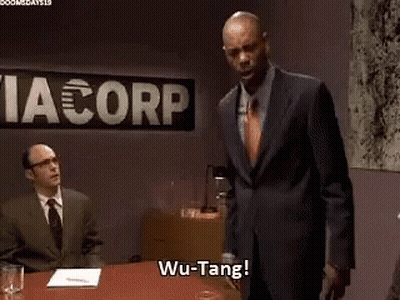Man In Suit In Front Of Via Corp Sign GIF