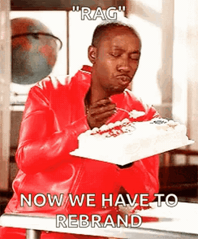 Man In Suit In Front Of Wall Saying Such Is Life GIF