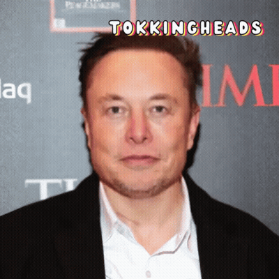 Man In Suit In Front Of Wall Saying Time GIF