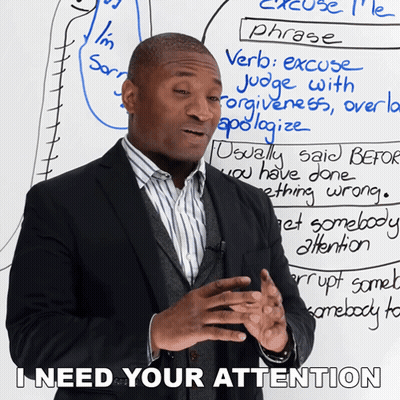 Man In Suit In Front Of Whiteboard Saying I Need Your Attention GIF