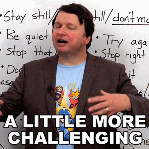 Man In Suit In Front Of Whiteboard With A Little More Challenging GIF
