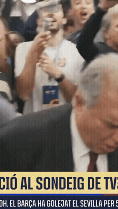 Man In Suit In Front Of Yellow Sign Saying CIO Al Sondeig De TV GIF