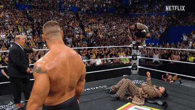 Man In Suit In Wrestling Ring With Netflix GIF
