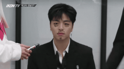 Man In Suit Interviewed By Woman On Ikon TV GIF