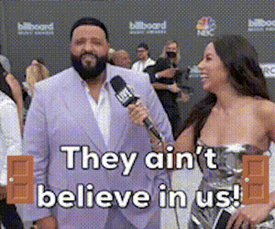 Man In Suit Interviewed By Woman Saying They Ain't Believe In Us GIF