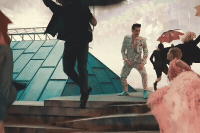 Man In Suit Jumping GIF