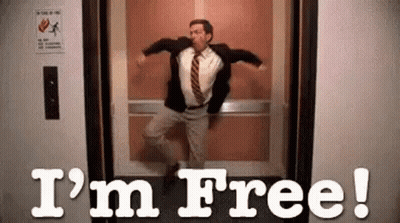 Man In Suit Jumping Out Of Elevator I M Free GIF