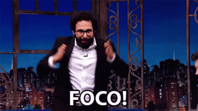 Man In Suit Jumping With Foco GIF