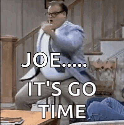 Man In Suit Jumping With Go Time GIF