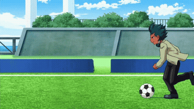 Man In Suit Kicking Soccer Ball GIF