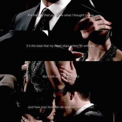 Man In Suit Kissing Woman's Hand GIF