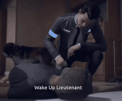 Man In Suit Kneeling Over Man Wake Up Lieutenant GIF