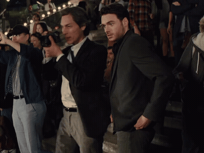 Man In Suit Laughing And Clapping GIF