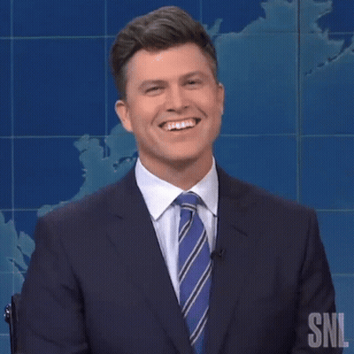 Man In Suit Laughing And Clapping GIF