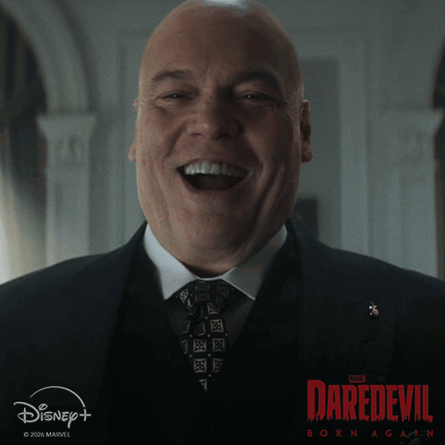 Man In Suit Laughing At Daredevil Poster GIF