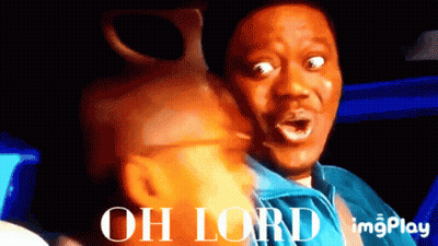 Man In Suit Laughing At Fox Advertisement GIF