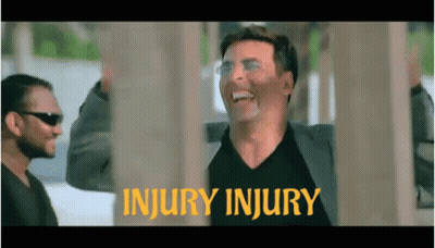 Man In Suit Laughing At Injury Injury Sign GIF