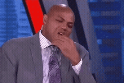 Man In Suit Laughing On TV Show GIF